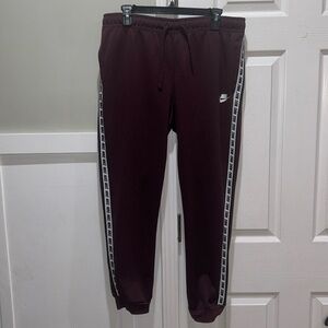 Nike size medium joggers burgundy / plum